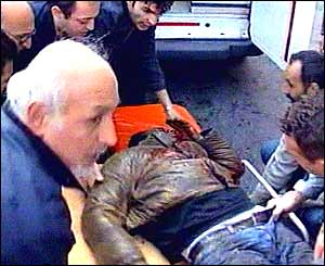 Blast victim on stretcher