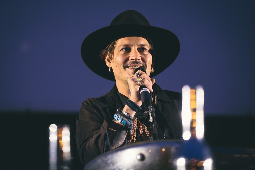 Johnny Depp described Glastonbury Festival as "beautiful chaotic madness" before introducing the film.