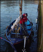Skipper Peter Mitchell prepares the boat
