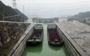 Cargo Boats travelling past the dam