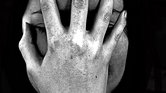 Hand to face...