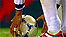 Footballer placing ball on ground