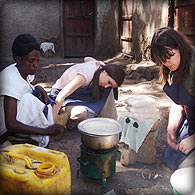 Gail and Vicky help make porridge