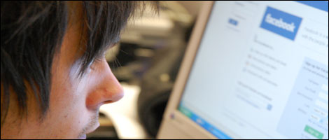 Ryan looks at the computer 
