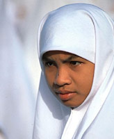 Indonesian girl in white Muslim headscarf