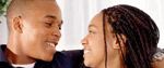man and woman smiling at each other