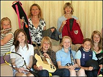 Heather and Camille with their children