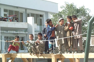 This orphanage has been taken to heart by the British soliders. They've built the children an adventure playground