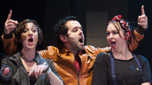 Nadia Albina, Daniel McGowan and Jude Mahon singing in Reasons to be Cheerful