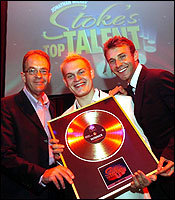 Jonathan Wilkes congratulates the winner of Stoke's Got Talent competition, Daniel Hewitt