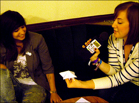 Sarah interviewing Carly