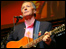 Stewart White with his guitar