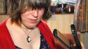 Nicola finishes straightening her fringe, but looks less than impressed