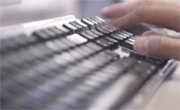Message boards (image: hand typing at keyboard)