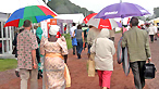 Brollies up as the rain comes down