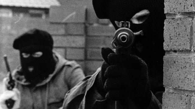 Two masked gunmen (Pacemaker Press Intl)