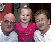 Dave, granddaughter and Mark