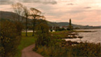 Colour view of coastal path leading to Battle of Largs Monument.