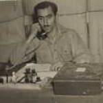 Fred on the telephone in Algiers