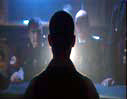 Photograph showing an agent facing interrogation