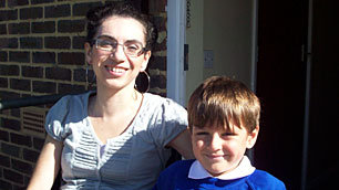 Isabella with Kirit in his school uniform.