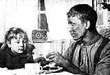 Image of a miner at home