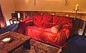 Sofa with deep red throw