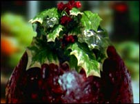 A Christmas pudding on a festive table