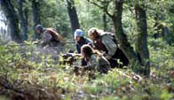 Photograph of a reconstructed scene showing Scottish warriors