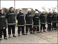 Young firefighters in uniform