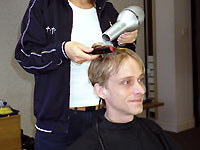 Mackenzie Crook getting his pudding bowl hair done