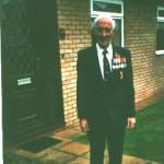 Leiutenant Commander Arthur William Chappell in later years, in the garden of his home.