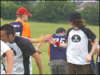 Two teams shaking hands - photo by Kristie Wilson.