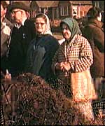 Relatives wait for news at the pithead
