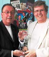 Bert Coules, on right, accepting an award.