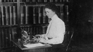 Helen Keller at her desk