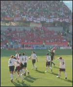 England players celebrate Wayne Rooney's second goal