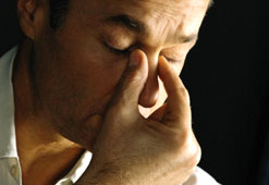 Tired-looking man