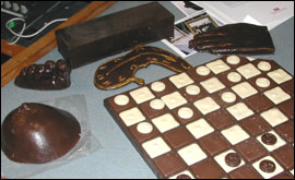 Chocolate draughtboard and body parts