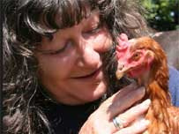 Mary Alice with a rescue chicken