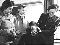 woman trying on gas mask