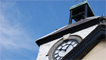 The clock tower on the town hall.