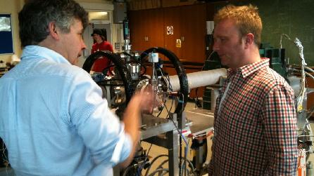 Mike Charlton shows Adam the positron beam Mike Charlton shows Adam the positron beam