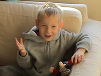 Sarah's son eating chocolate