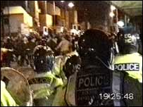 Police at the scene of the riot