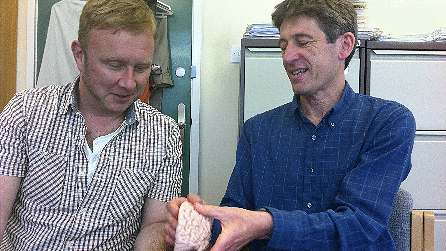 Adam Walton and Prof. John Aggleton with a model of the brain Adam Walton and Prof. John Aggleton with a model of the brain