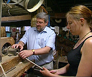 Richard Holdsworth showing Alice Roberts the processes used to make rope at The Ropery