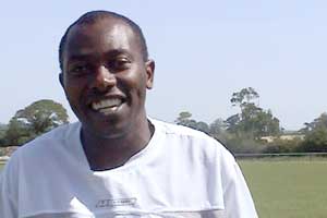 Geoffrey coaches local children for the local cricket side.