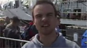 Mark with the deck of a ship in the background