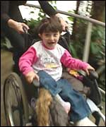 Arta in a wheelchair
